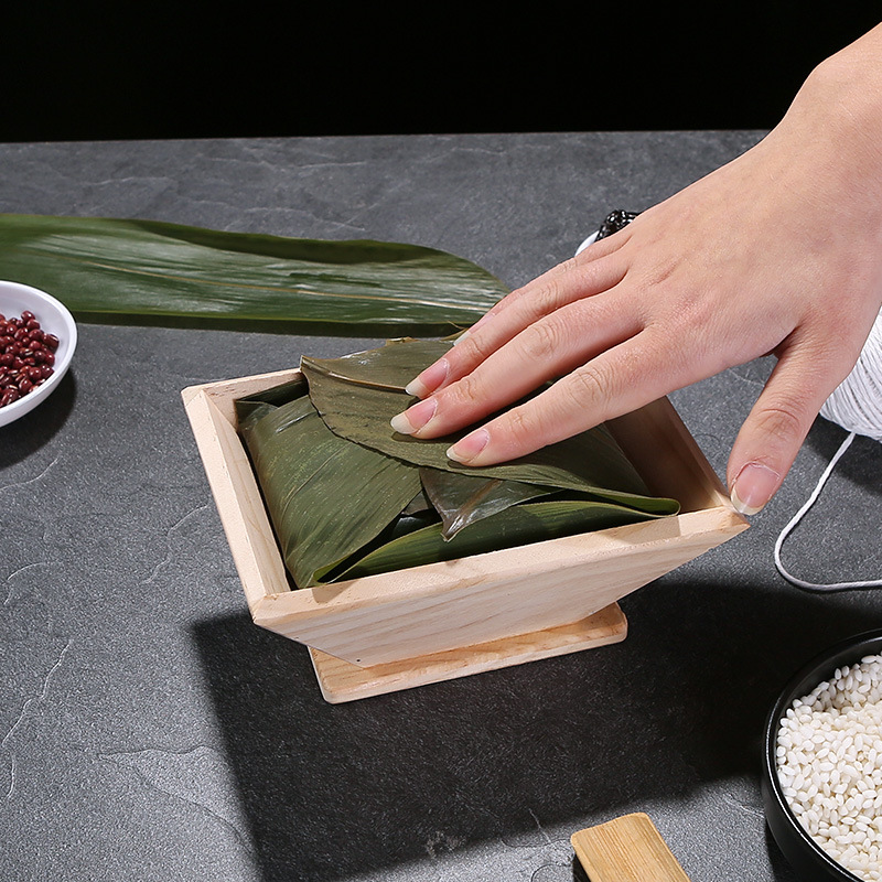قالب Zongzi الخشبي لمهرجان قوا - مراجعة Kitchen Gadgets Dumpling Maker وسعره
